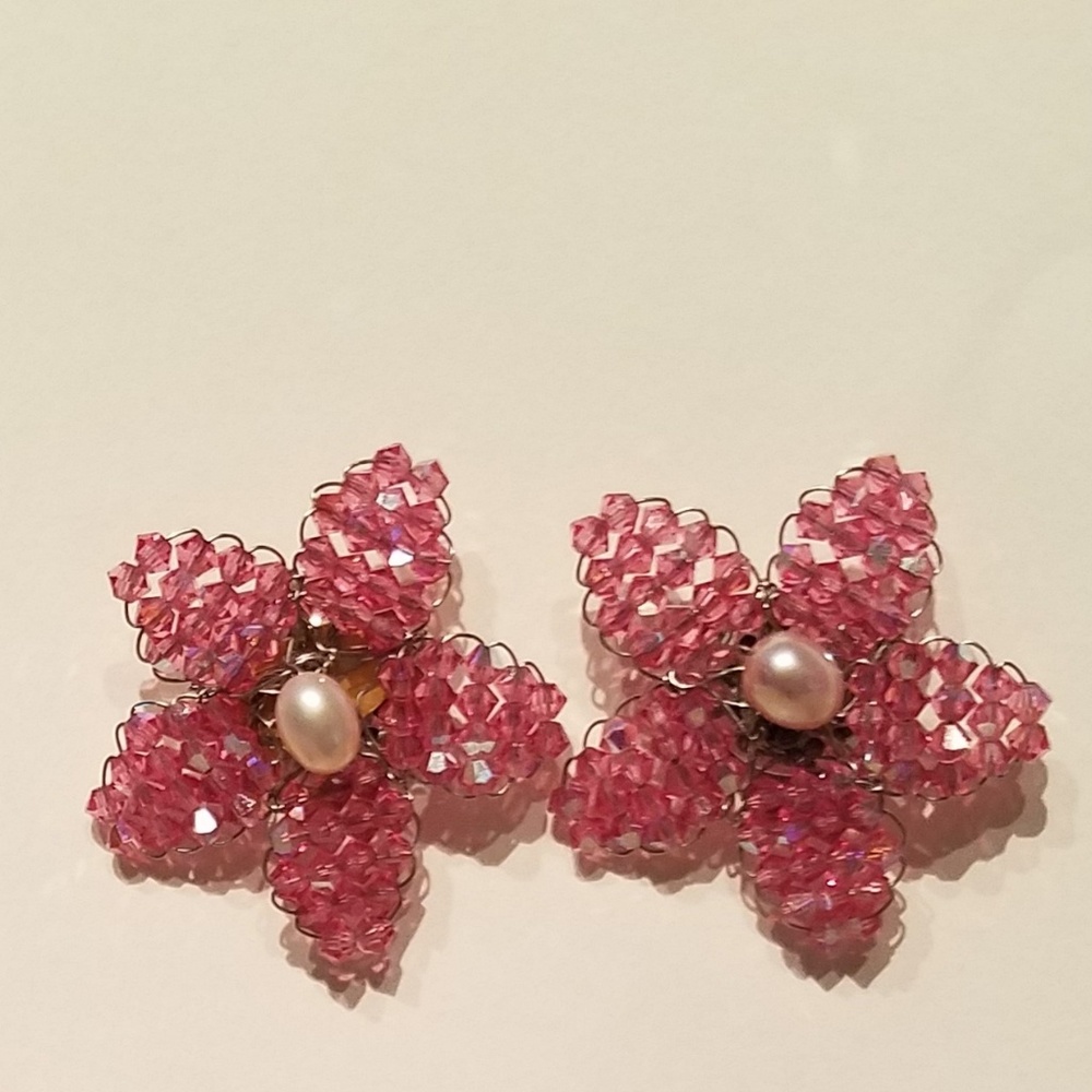 Hand beaded pierced earrings.